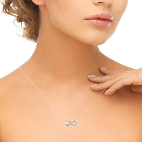Rose gold Infinity Pendant with Round Cut Diamonds in Pavé Setting