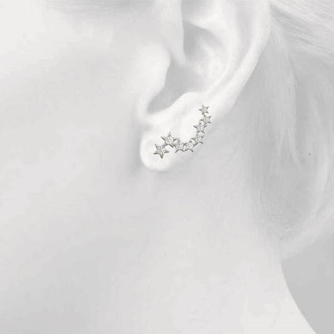 White gold Star Cluster Diamond Crescent Earrings with Round Cut Stones on a Curved Band and Prong Setting
