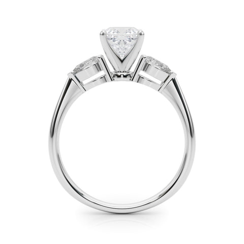 White gold Three-Stone Cushion Diamond Ring with Pear Side Stones on a Platinum Band with Four-Prong Setting