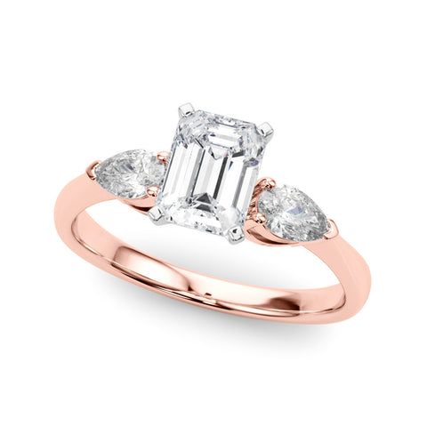 Rose gold Three-Stone Emerald Diamond Ring with Pear Side Stones on a Platinum Band with Four-Prong Setting