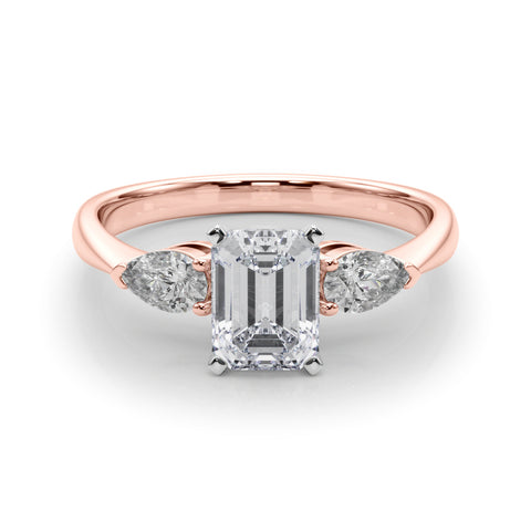 Rose gold Three-Stone Emerald Diamond Ring with Pear Side Stones on a Platinum Band with Four-Prong Setting