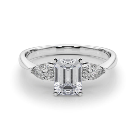 White gold Three-Stone Emerald Diamond Ring with Pear Side Stones on a Platinum Band with Four-Prong Setting