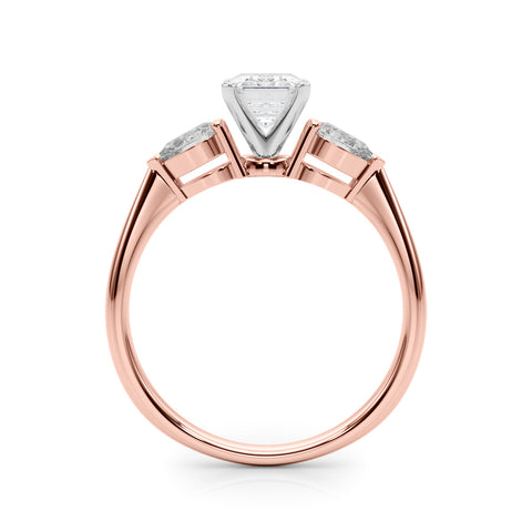 Rose gold Three-Stone Emerald Diamond Ring with Pear Side Stones on a Platinum Band with Four-Prong Setting