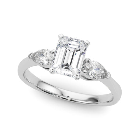 White gold Three-Stone Emerald Diamond Ring with Pear Side Stones on a Platinum Band with Four-Prong Setting