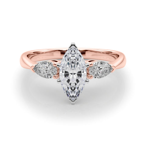 Rose gold Three-Stone Marquise Diamond Ring with Pear Side Stones on a Platinum Band with Four-Prong Setting