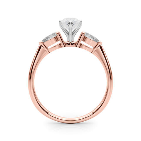 Rose gold Three-Stone Marquise Diamond Ring with Pear Side Stones on a Platinum Band with Four-Prong Setting