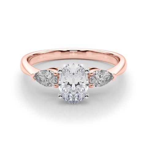 Rose gold Three-Stone Oval Diamond Ring with Pear Side Stones on a Platinum Band with Four-Prong Setting