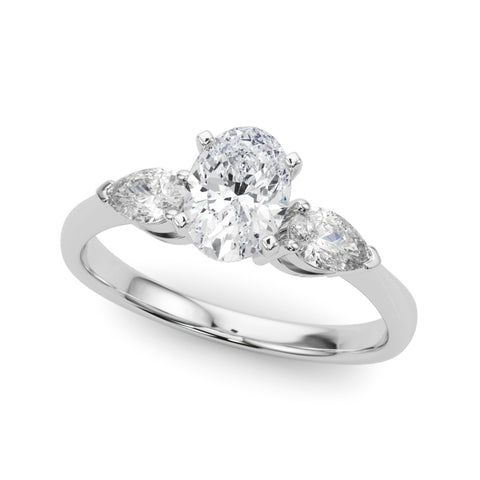 White gold Three-Stone Oval Diamond Ring with Pear Side Stones on a Platinum Band with Four-Prong Setting