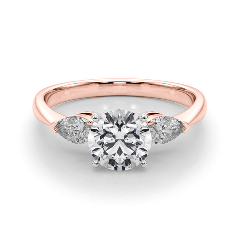 Rose gold Three-Stone Round Diamond Ring with Pear Side Stones on a Platinum Band with Four-Prong Setting