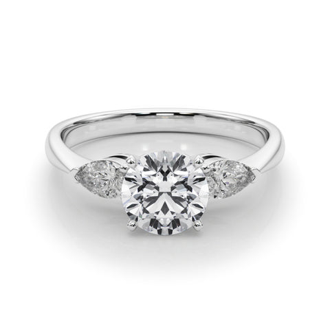 White gold Three-Stone Round Diamond Ring with Pear Side Stones on a Platinum Band with Four-Prong Setting