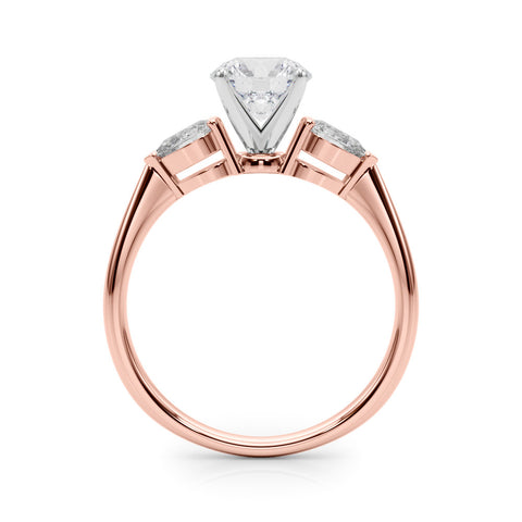 Rose gold Three-Stone Round Diamond Ring with Pear Side Stones on a Platinum Band with Four-Prong Setting