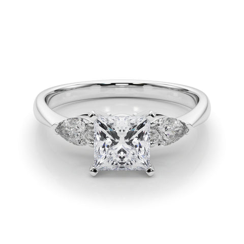 White gold Three-Stone Princess Diamond Ring with Pear Side Stones on a Platinum Band with Four-Prong Setting