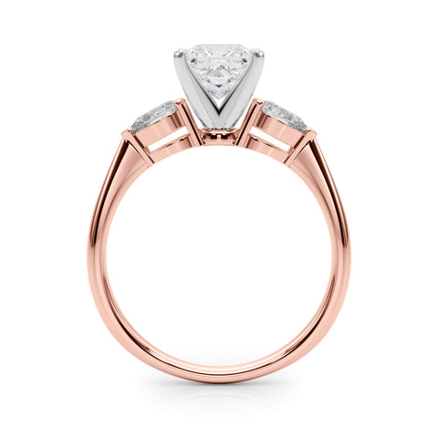 Rose gold Three-Stone Princess Diamond Ring with Pear Side Stones on a Platinum Band with Four-Prong Setting