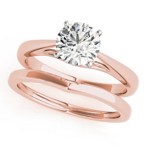 Rose gold Round Solitaire Diamond Engagement Ring with Cathedral Setting and Four-Prong Mount on a Classic Band