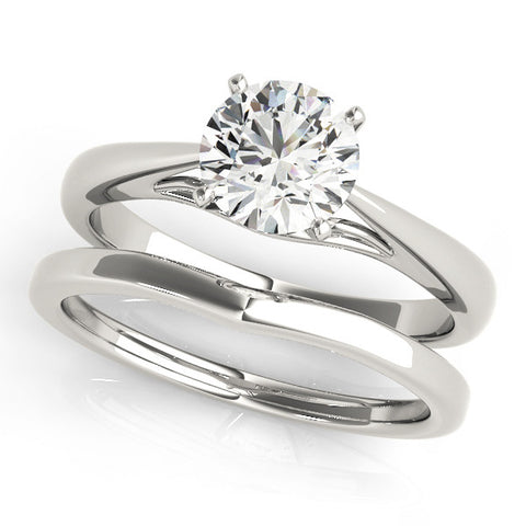 White gold Round Solitaire Diamond Engagement Ring with Cathedral Setting and Four-Prong Mount on a Classic Band