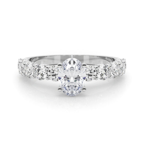 White gold Oval Diamond Prong Setting with Side Stones on a Pave Band