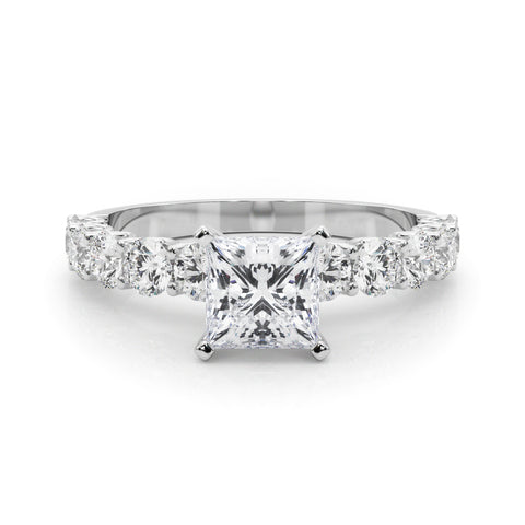 White gold Princess Diamond Prong Setting with Side Stones on a Pave Band