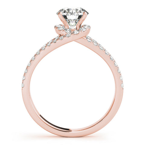 Rose gold Round Cut Solitaire Diamond with Pavé Twist Band and Four-Prong Setting