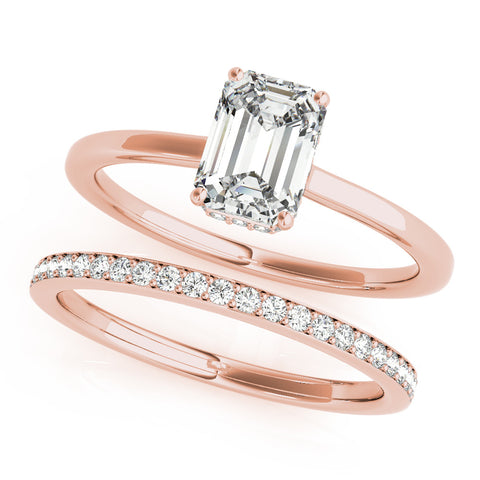 Rose gold Emerald Cut Solitaire Engagement Ring with Four-Prong Setting on a Classic Band