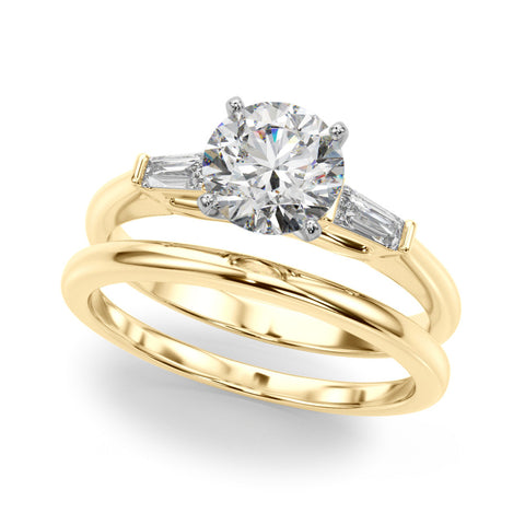 Yellow gold Round Solitaire with Tapered Baguette Side Stones on a Classic Band with Four-Prong Setting