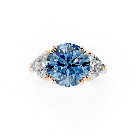 Rose gold Fancy Blue Round cut Brilliant and Trilliant Diamond Three-Stone Ring