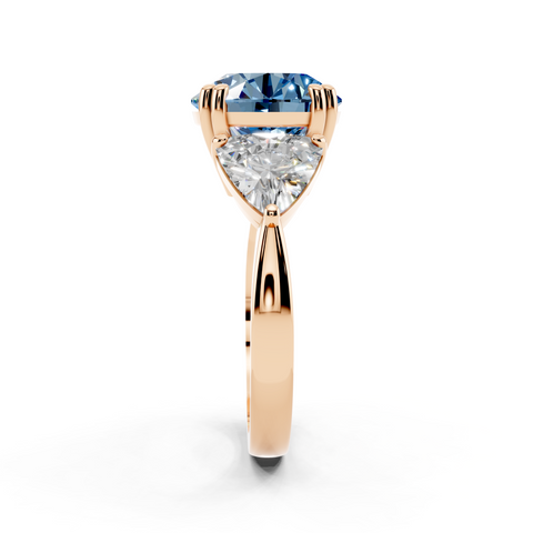 Rose gold Fancy Blue Round cut Brilliant and Trilliant Diamond Three-Stone Ring