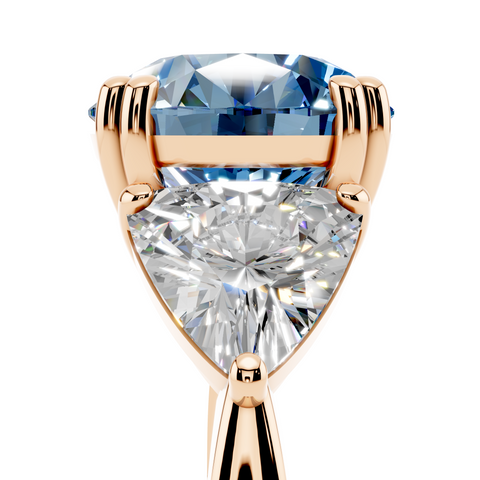 Rose gold Fancy Blue Round cut Brilliant and Trilliant Diamond Three-Stone Ring