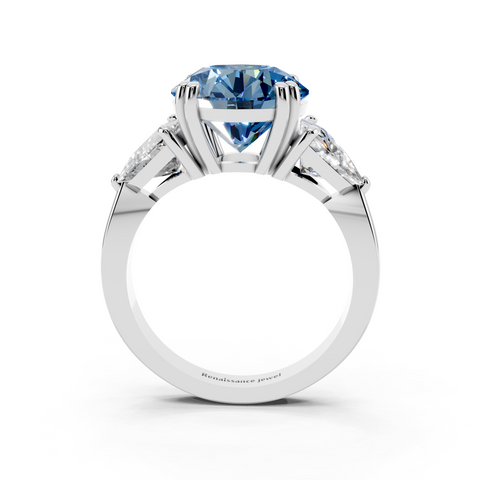 Silver Fancy Blue Round cut Brilliant and Trilliant Diamond Three-Stone Ring
