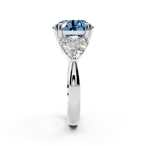 Platinum Fancy Blue Round cut Brilliant and Trilliant Diamond Three-Stone Ring