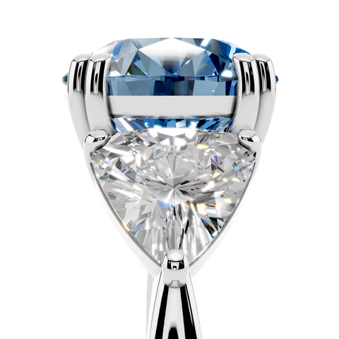 Platinum Fancy Blue Round cut Brilliant and Trilliant Diamond Three-Stone Ring