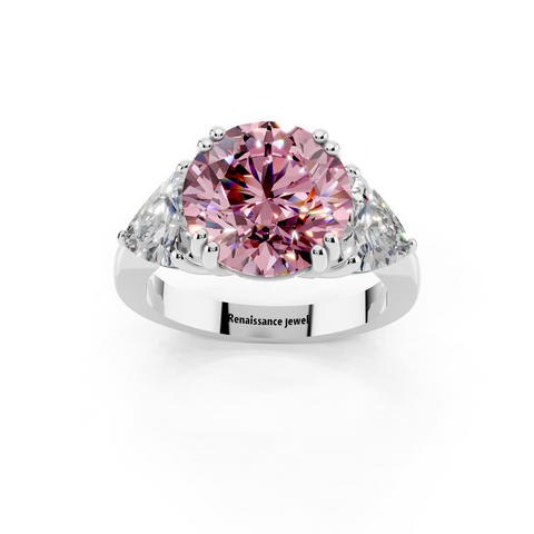 Platinum Fancy Pink Round cut Brilliant and Trilliant Diamond Three-Stone Ring