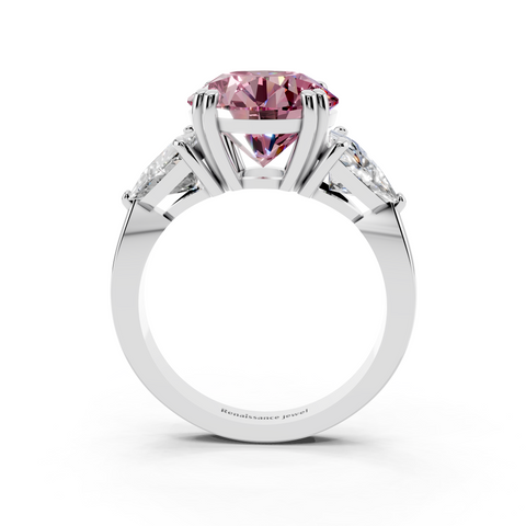 Platinum Fancy Pink Round cut Brilliant and Trilliant Diamond Three-Stone Ring