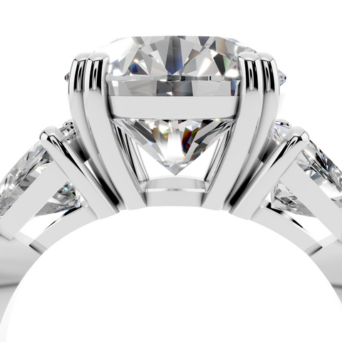 Platinum Round Brilliant and Trilliant Diamond Three-Stone Ring