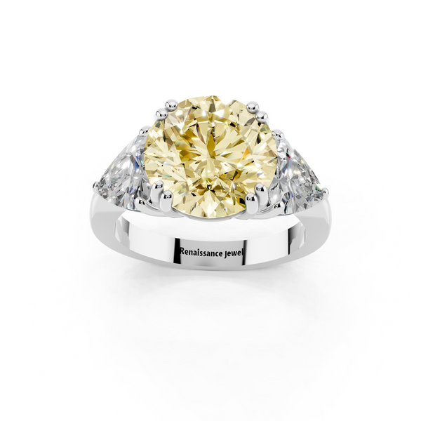 Platinum 3.12 Carat Yellow VVS2 Round Brilliant and Trilliant Diamond Three-Stone Ring
