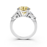 Platinum 3.12 Carat Yellow VVS2 Round Brilliant and Trilliant Diamond Three-Stone Ring