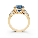 18K Yellow Gold 1.52 Carat Blue VS1 Round Brilliant and Trilliant Diamond Three-Stone Ring