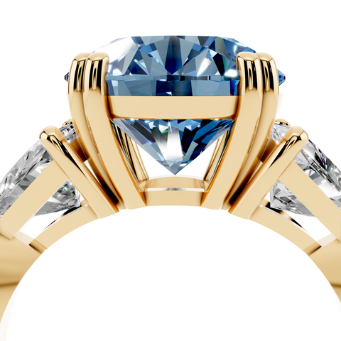 Yellow gold Fancy Blue Round cut Brilliant and Trilliant Diamond Three-Stone Ring