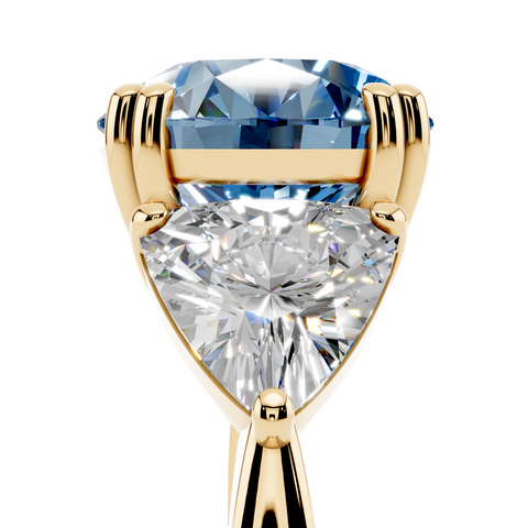 Yellow gold Fancy Blue Round cut Brilliant and Trilliant Diamond Three-Stone Ring