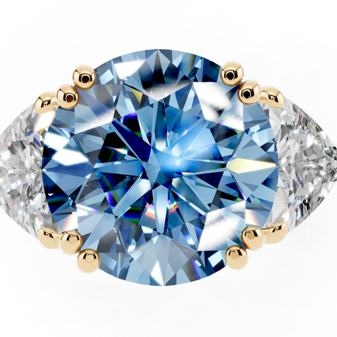 Yellow gold Fancy Blue Round cut Brilliant and Trilliant Diamond Three-Stone Ring