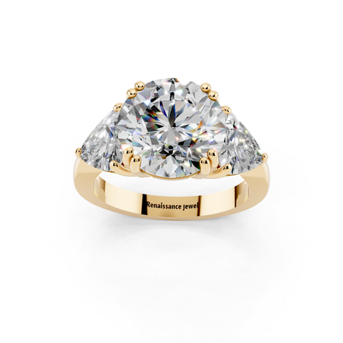Yellow gold Round Brilliant and Trilliant Diamond Three-Stone Ring