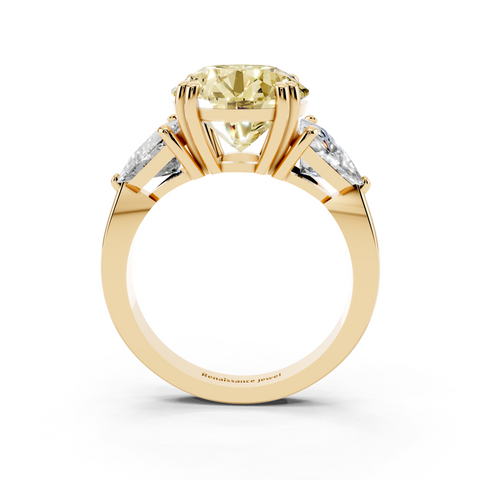Yellow gold Fancy Yellow Round cut Brilliant and Trilliant Diamond Three-Stone Ring