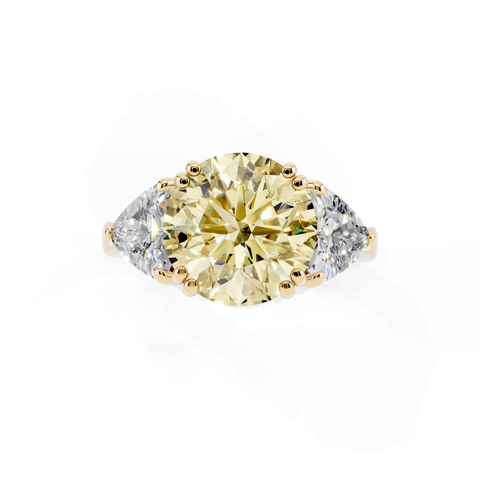 Yellow gold Fancy Yellow Round cut Brilliant and Trilliant Diamond Three-Stone Ring