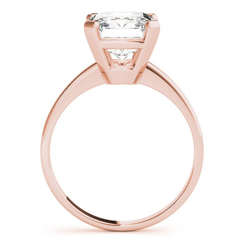 Rose gold Emerald Cut Solitaire Ring with Four-Prong Setting and Classic Band