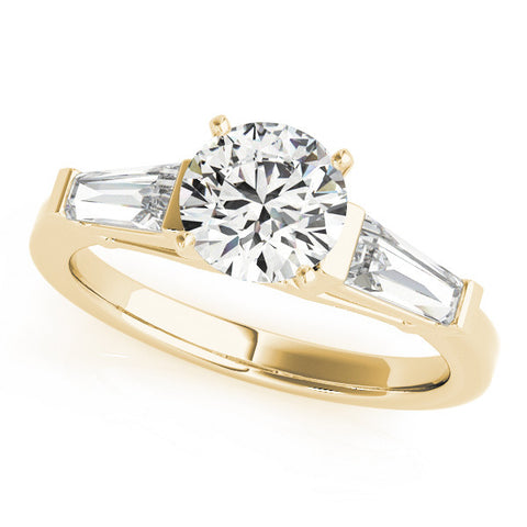 Yellow gold Round Cut Diamond Solitaire Ring with Tapered Baguette Accents and Four-Prong Setting