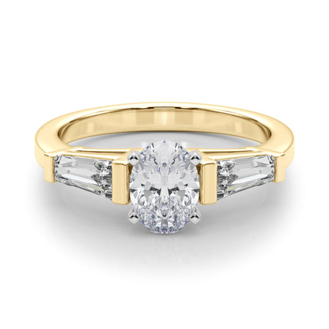 Yellow gold Oval Cut Diamond Solitaire Ring with Tapered Baguette Accents and Four-Prong Setting