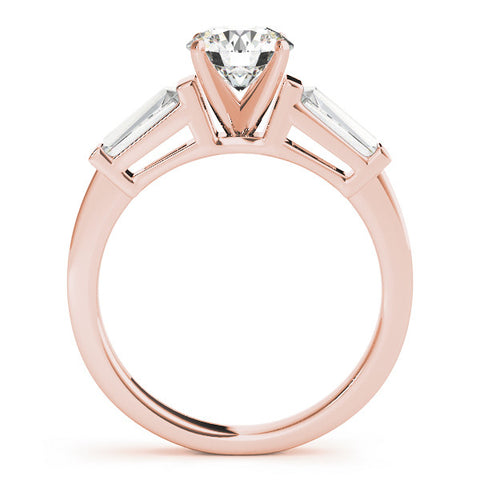 Rose gold Round Cut Diamond Solitaire Ring with Tapered Baguette Accents and Four-Prong Setting