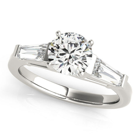 White gold Round Cut Diamond Solitaire Ring with Tapered Baguette Accents and Four-Prong Setting