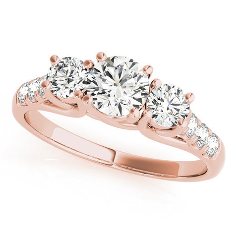 Rose gold Three-Stone Round Cut Diamond Ring with Channel Set Band and Four-Prong Setting