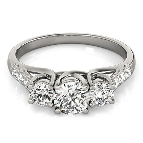 White gold Three-Stone Round Cut Diamond Ring with Channel Set Band and Four-Prong Setting