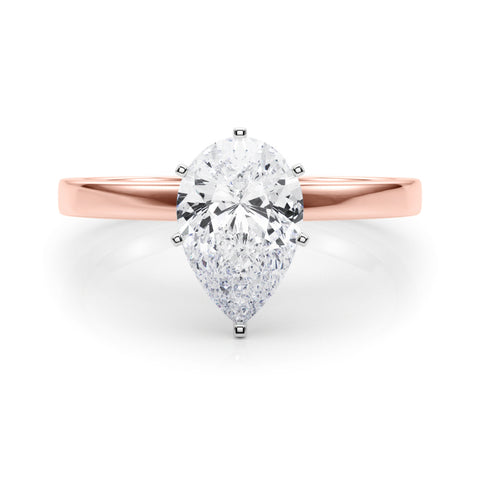 Rose gold Pear Solitaire Diamond Engagement Ring with Four-Prong Setting on a Classic Band